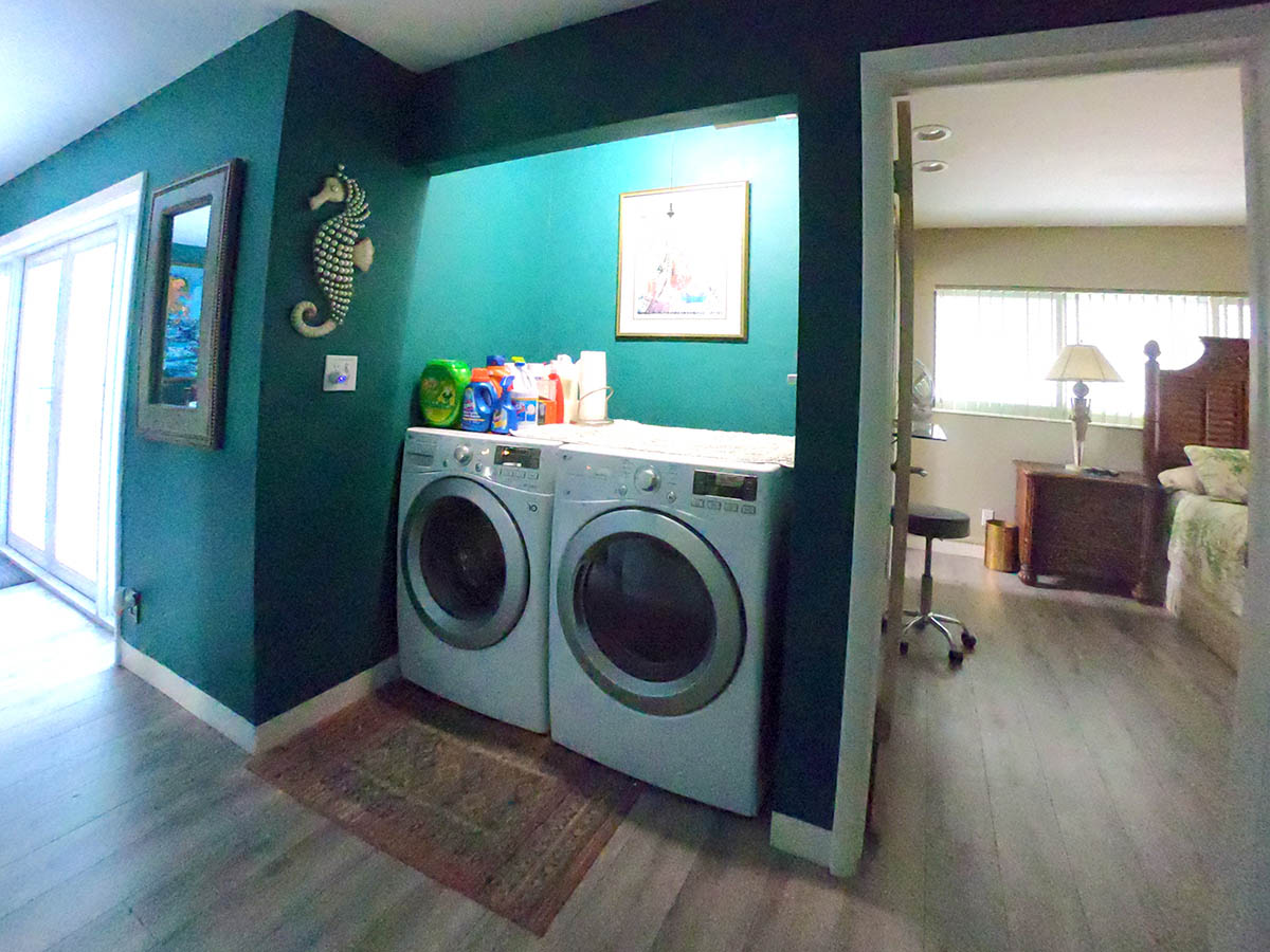 New LG Front Loading Washer and Dryer (plus cleaning supplies) are near linen closet and Master Suite